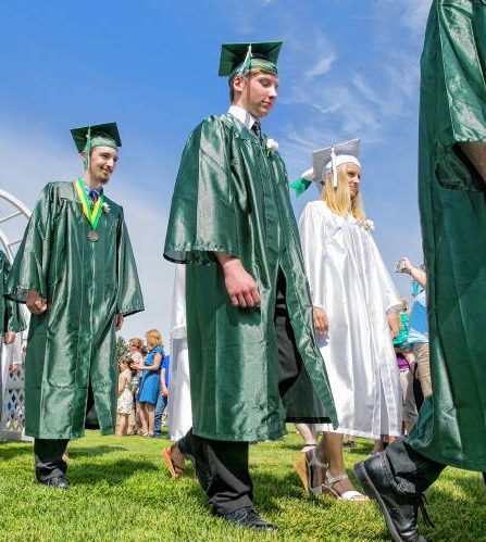 Graduates march into the Pembroke Academy ceremony on Saturday, June 9, 2018.